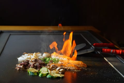 Chef cooking on teppanyaki