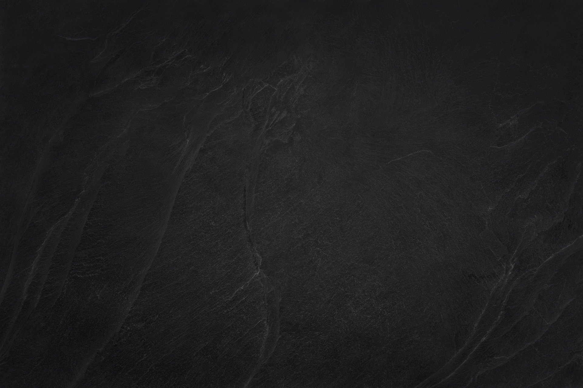Dark grey black slate texture in natural pattern